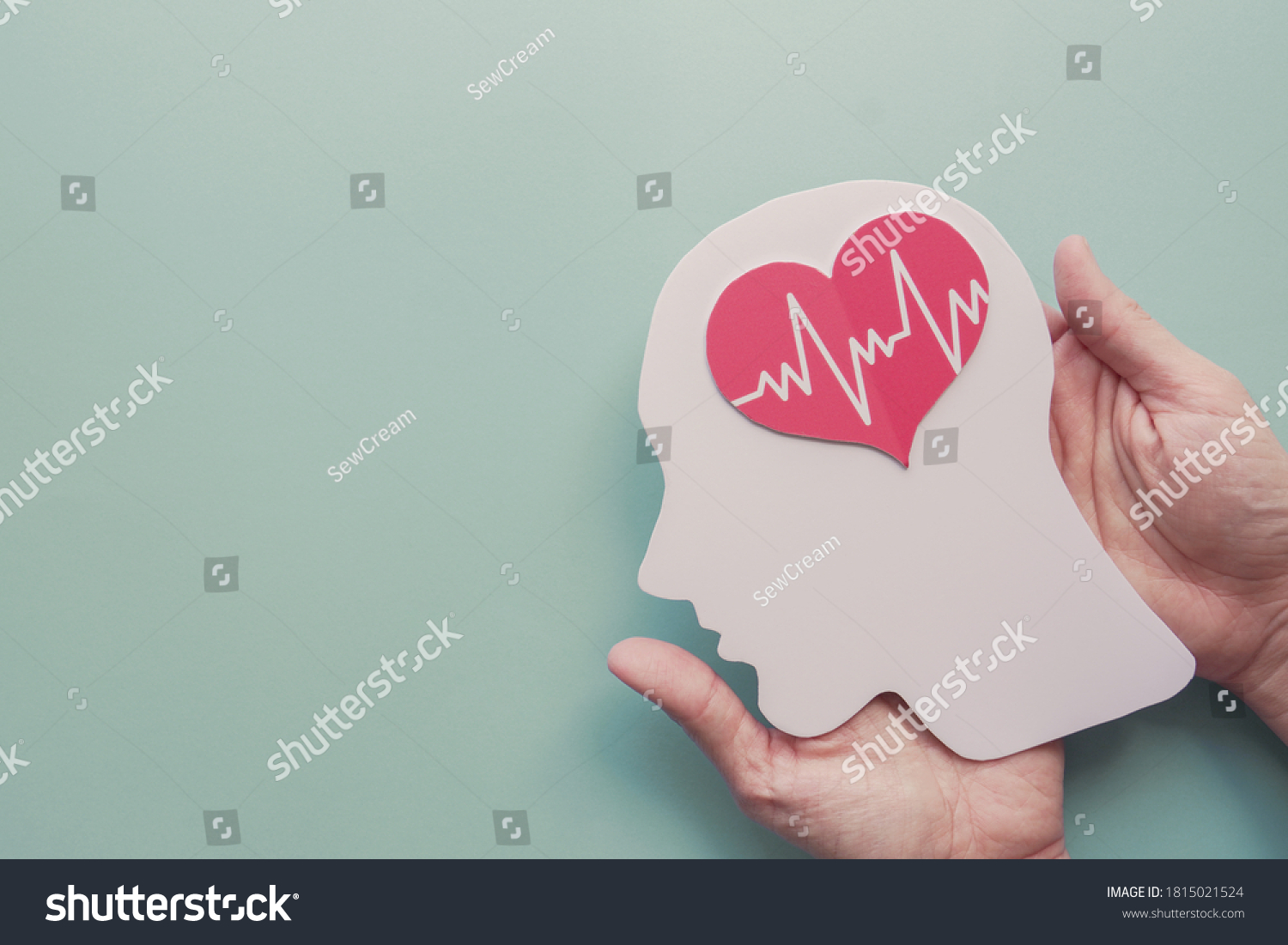 Hands holding paper brain and heart, brain stroke, world heart day, world mental health day, Alzheimer and wellness concept #1815021524