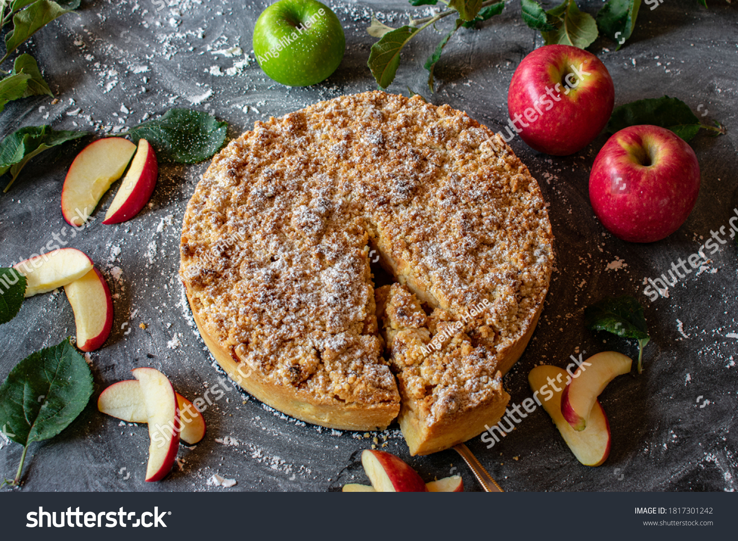 Apple crumble cake on dark background #1817301242