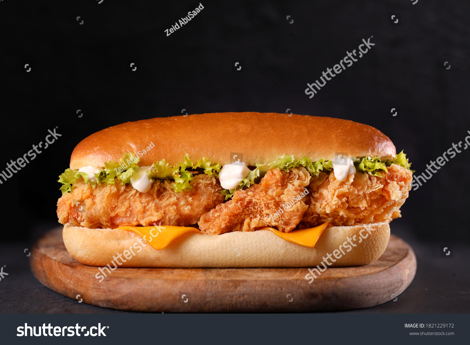  Fried chicken sandwich with lettuce and mayo #1821229172