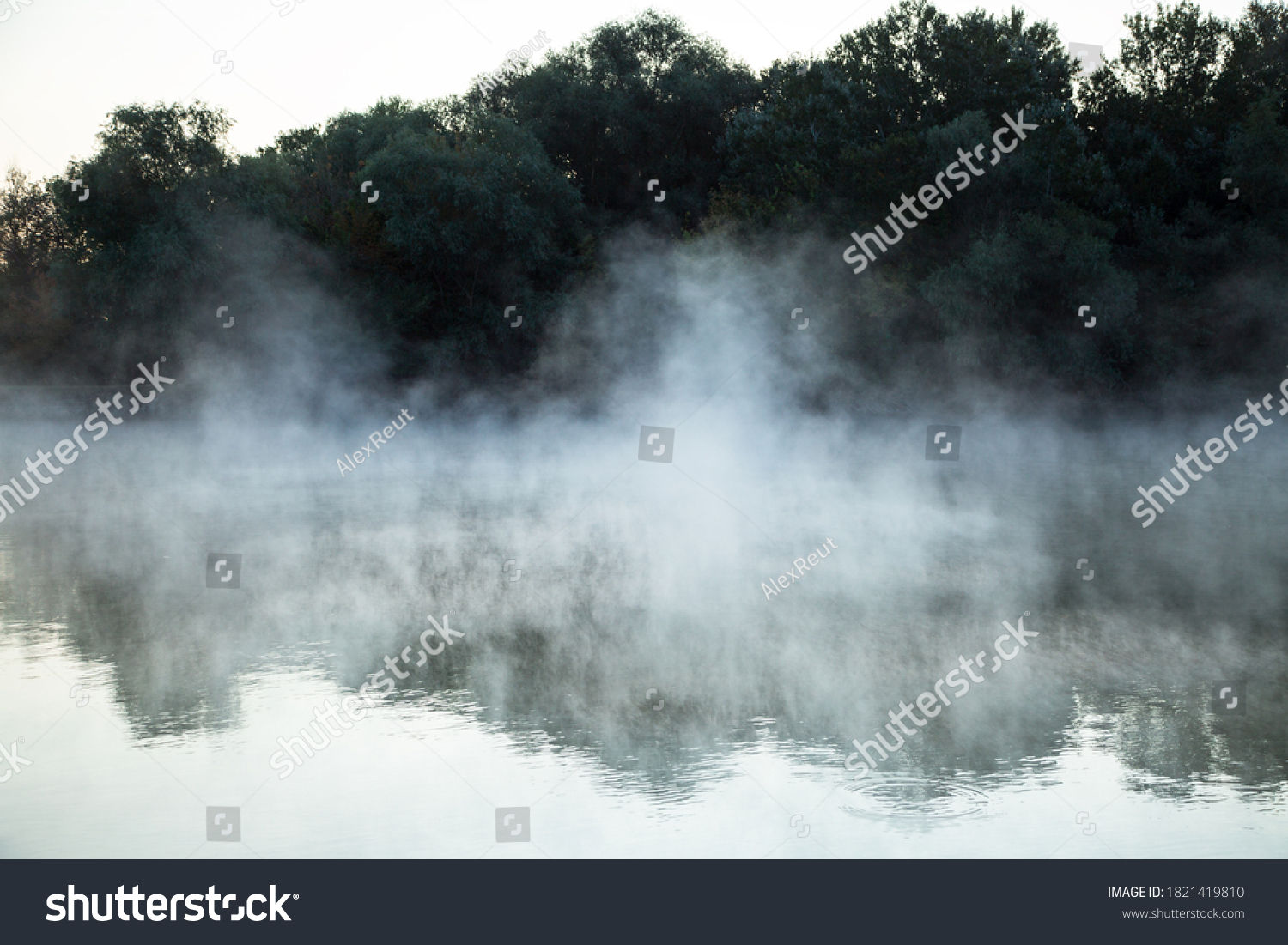 morning evaporation of water over the river, fog over the water #1821419810