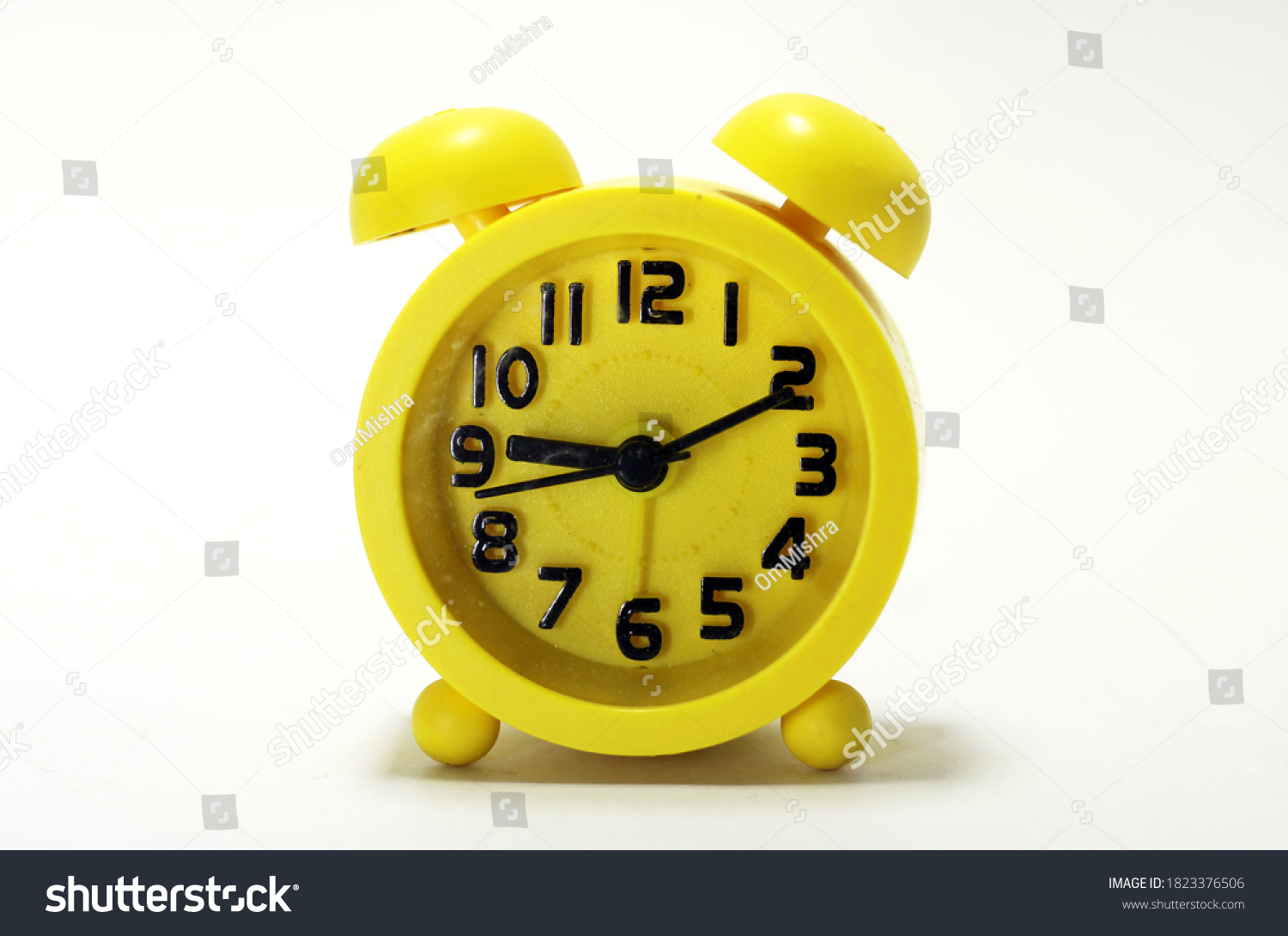 A beautiful  and  colorful small alarm clock #1823376506