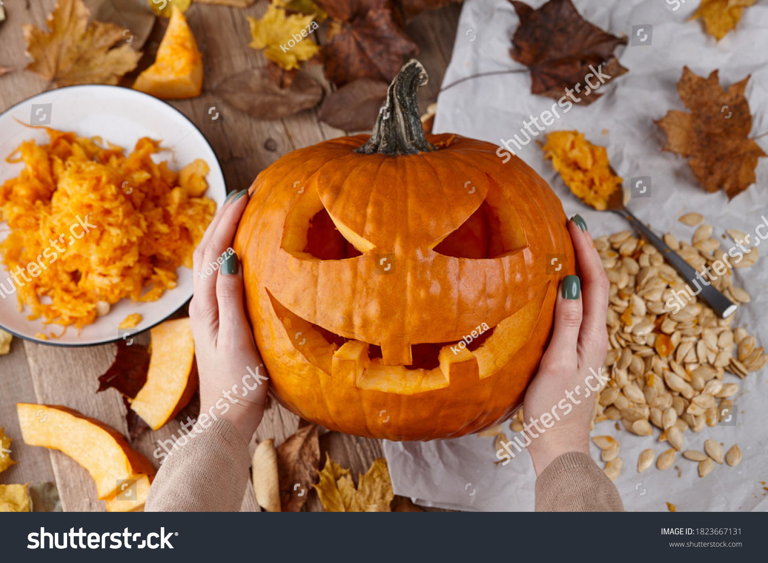 Making scary pumpkin jack for Halloween, holiday preparation #1823667131