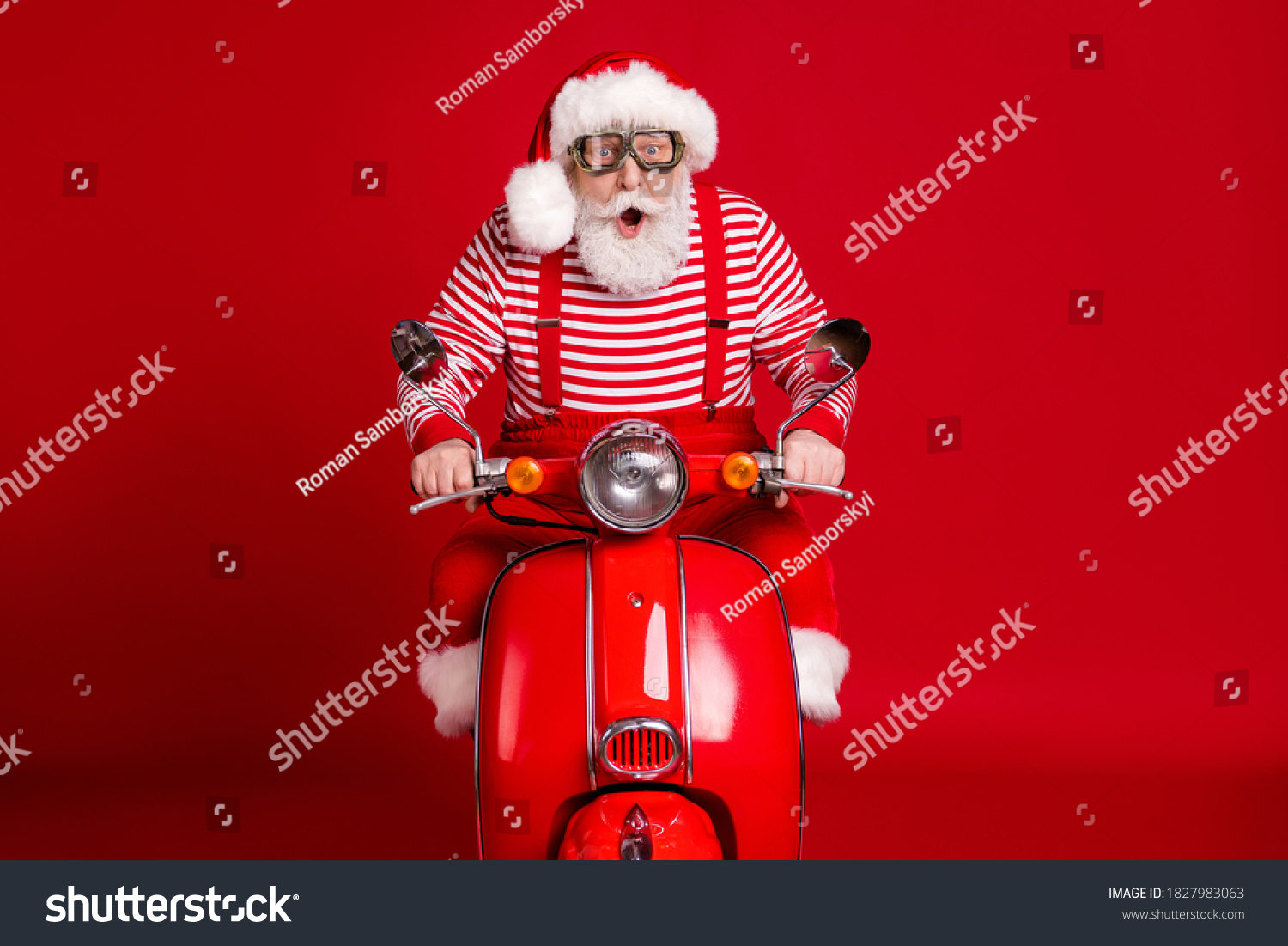Portrait of his he handsome amazed impressed bearded Santa father riding moped delivering gifts tradition journey fast speed hurry rush isolated bright vivid shine vibrant red color background #1827983063