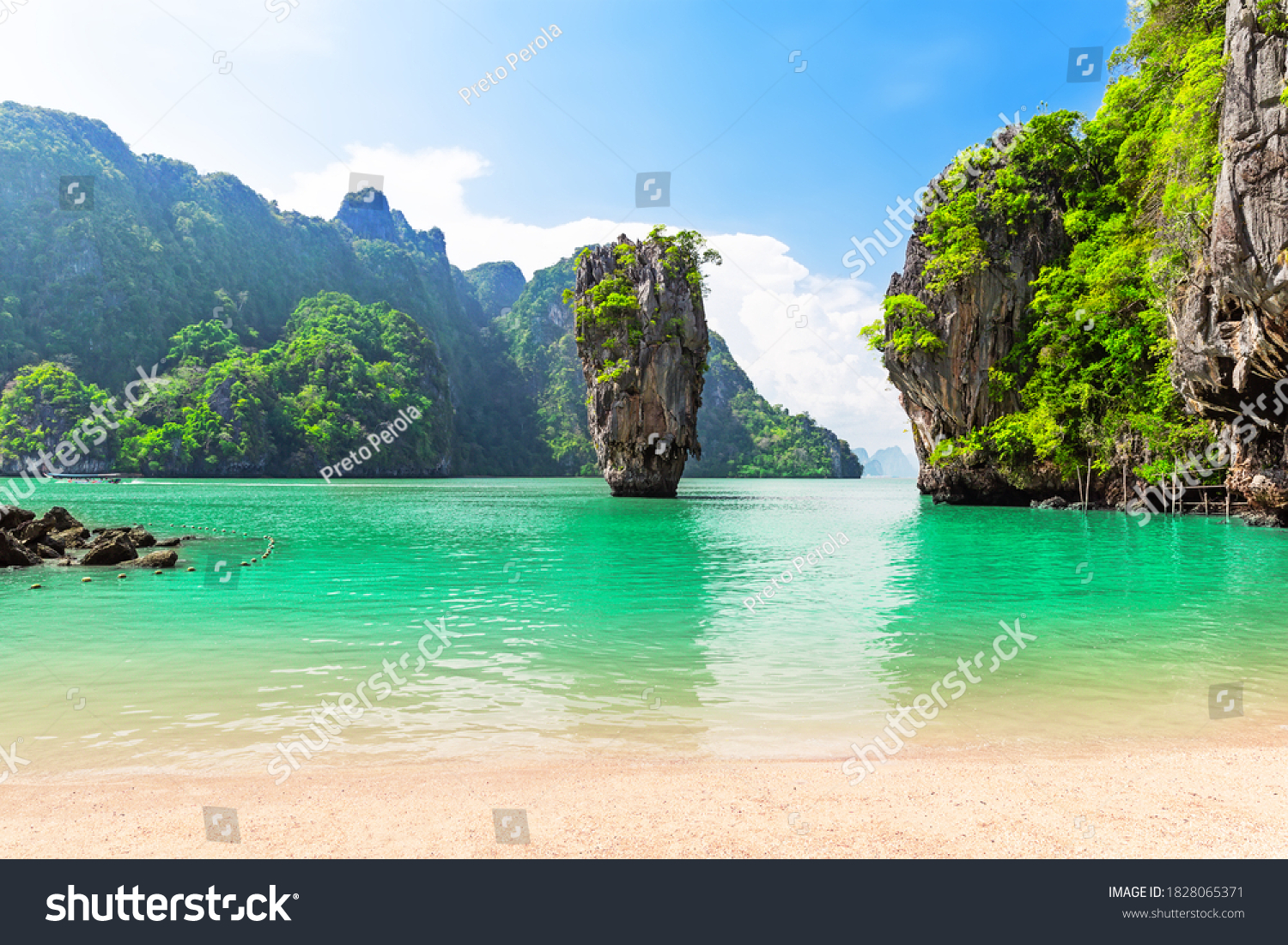 Famous James Bond island near Phuket in Thailand. Travel photo of James Bond island in Phang Nga bay, Thailand.  #1828065371