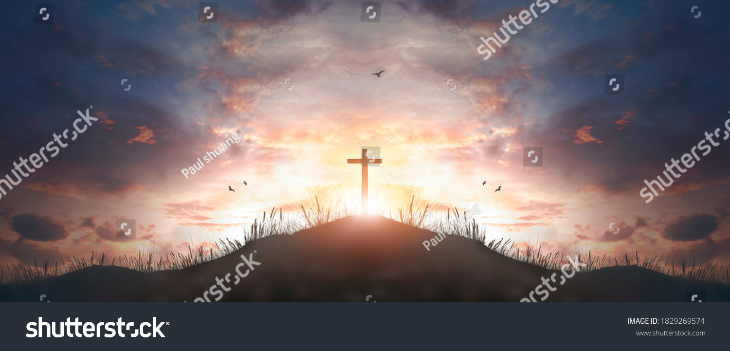 cross religion symbol silhouette in grass over sunset  sky cross religion symbol silhouette in grass over sunset or sunrise sky  #1829269574