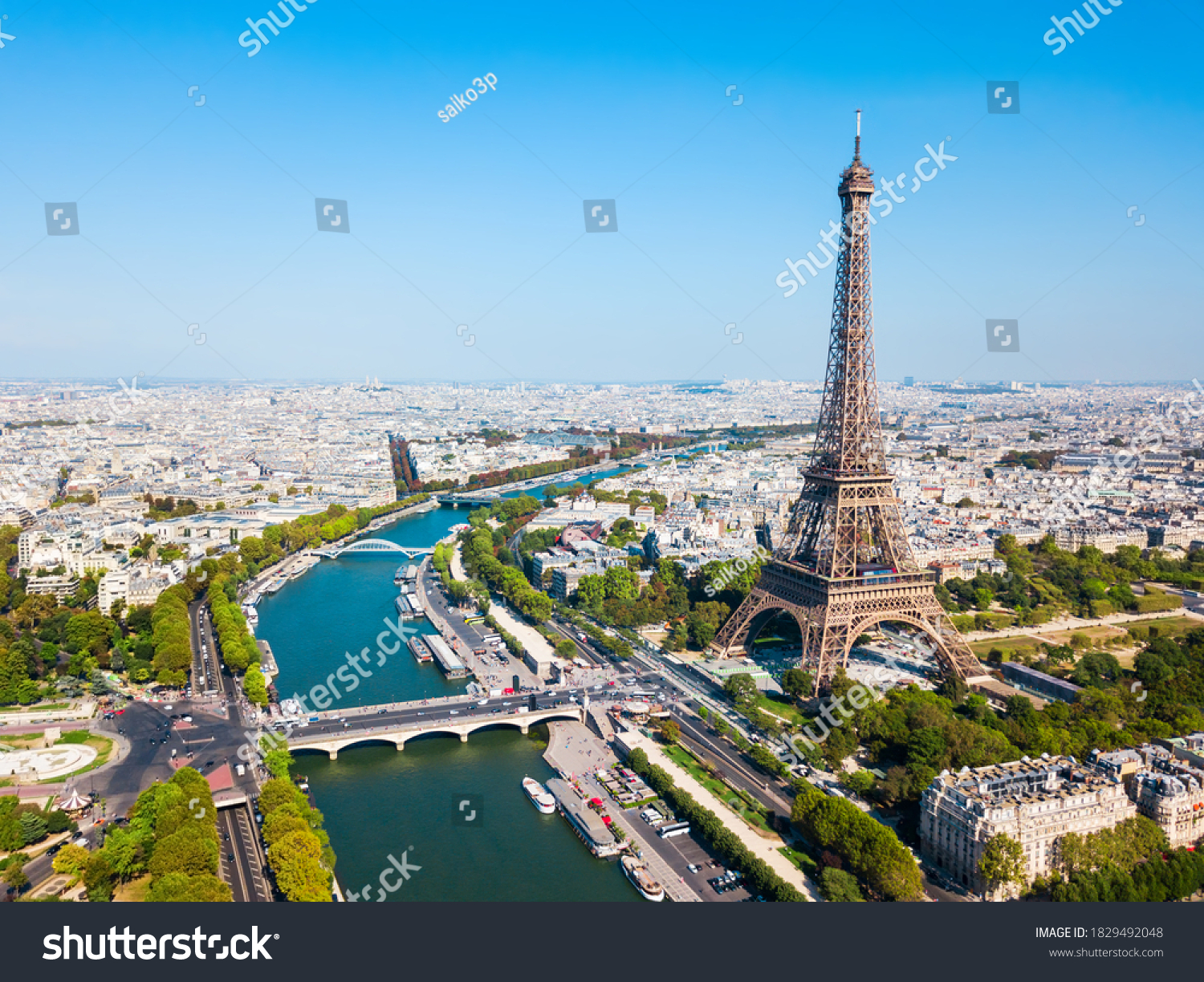 Eiffel Tower or Tour Eiffel aerial view, is a wrought iron lattice tower on the Champ de Mars in Paris, France #1829492048