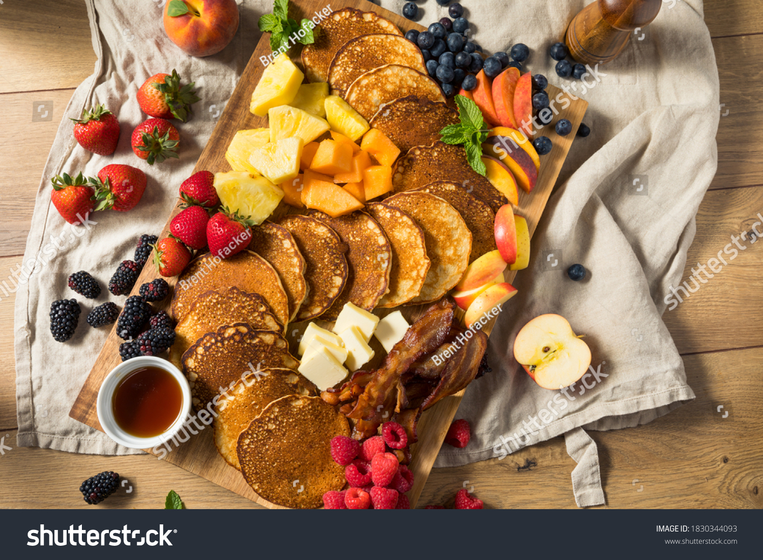 Homemade Pancake Charcuterie Board with Fruit and Bacon #1830344093