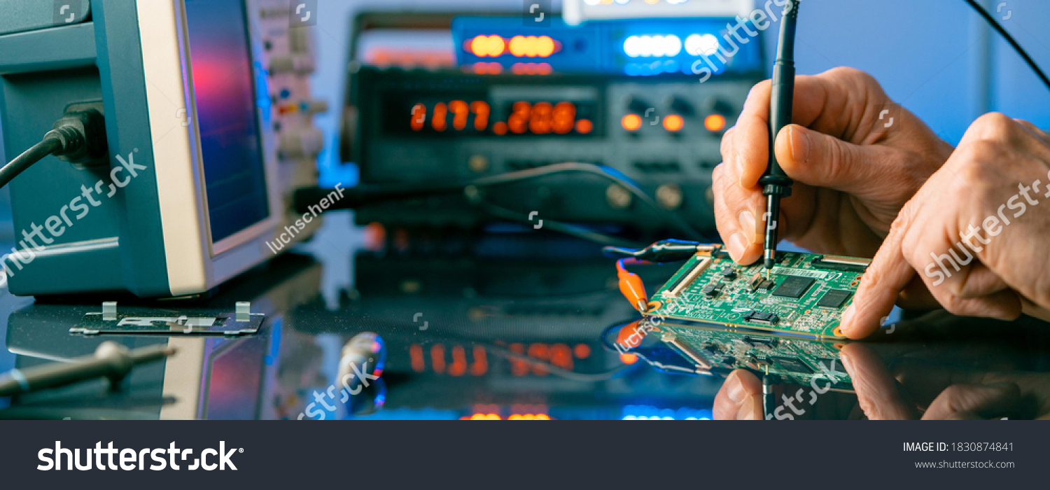 Debugging electronics device. PCB witch microcontroller in electronics laboratory #1830874841