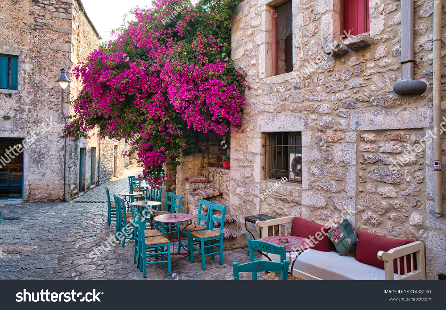 Narrow streets of Areopoli town on the Mani peninsula in Greece #1831438930