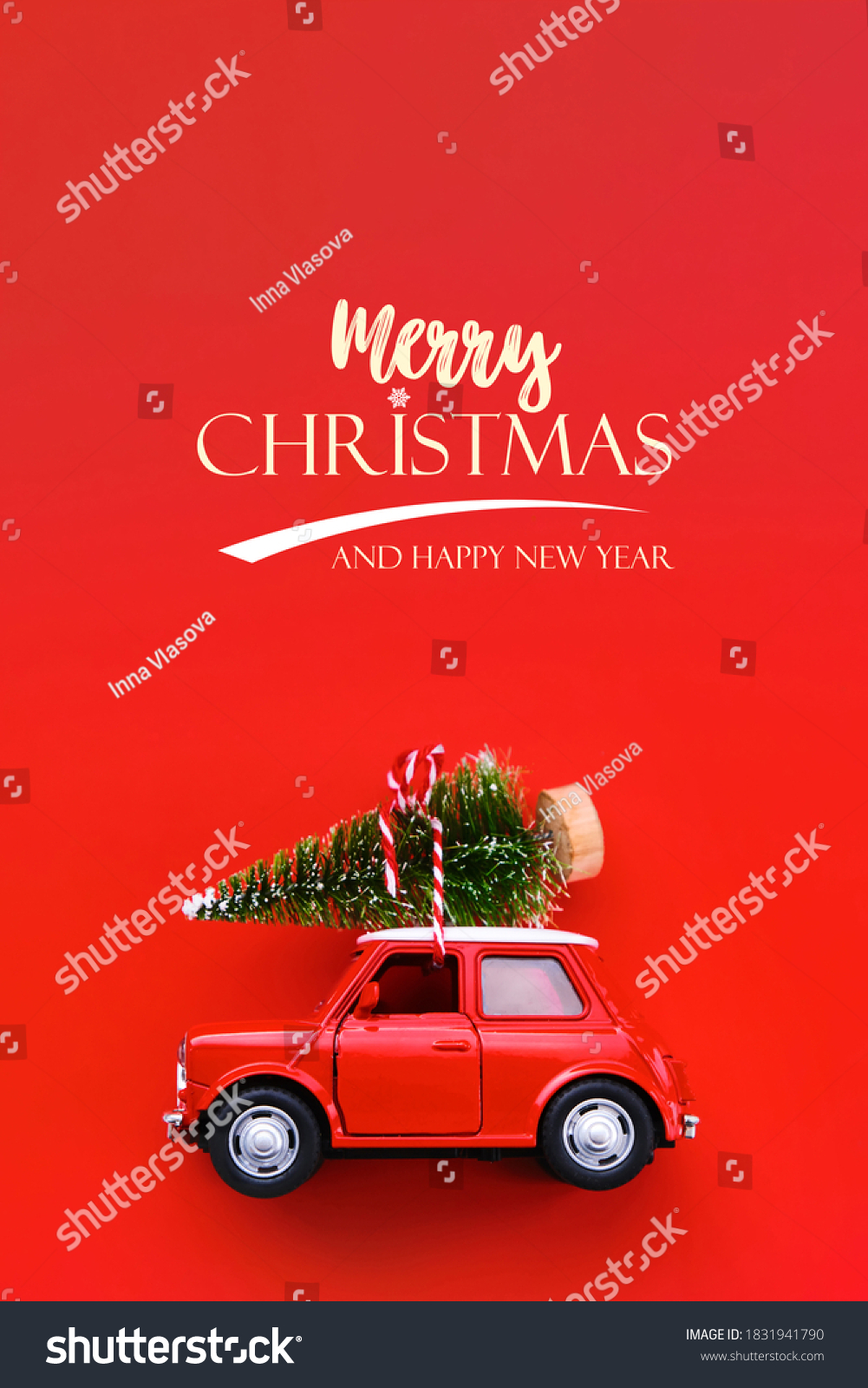 Minimal design for celebrating christmas or new year greeting card. Gift delivery concept. Little red toy car and Christmas tree on a red background #1831941790