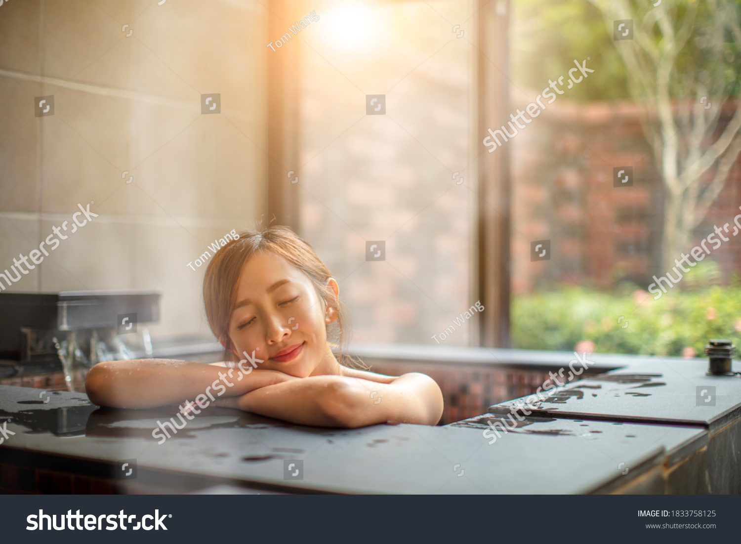beautiful Young woman relaxing  in hot spring #1833758125