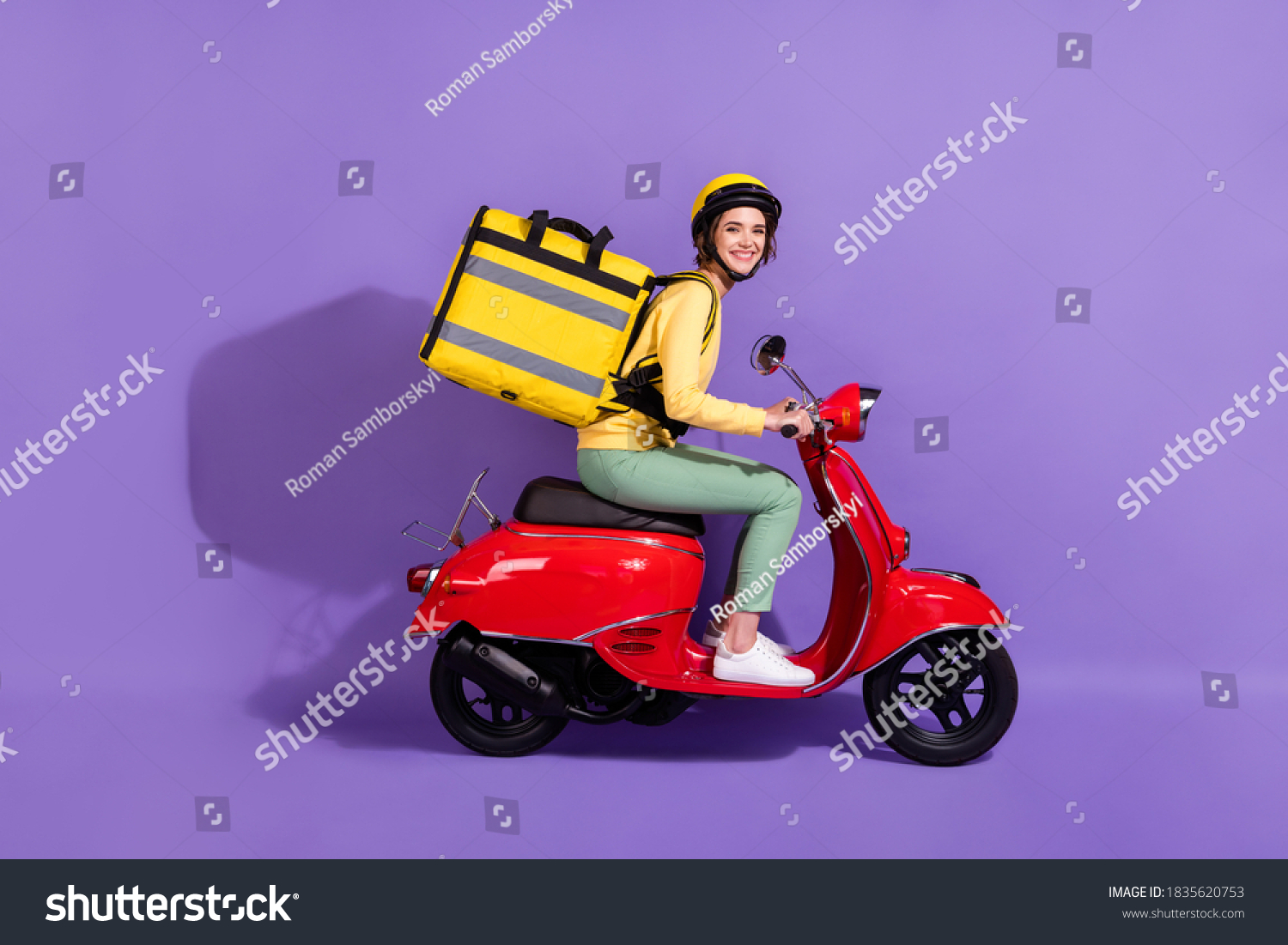 Profile side view of her she nice attractive cheerful girl riding bike delivering, bringing cafe food order fast speed express isolated bright vivid shine vibrant lilac violet purple color background #1835620753