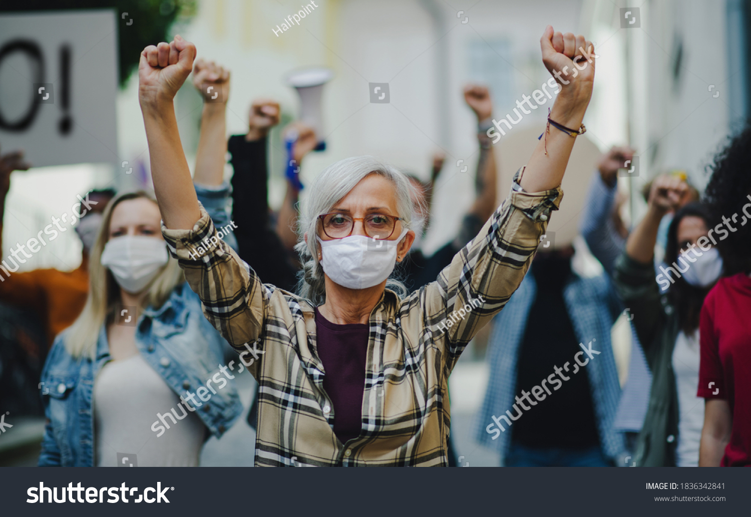 Group of people activists protesting on streets, women march, demonstration and coronavirus concept. #1836342841