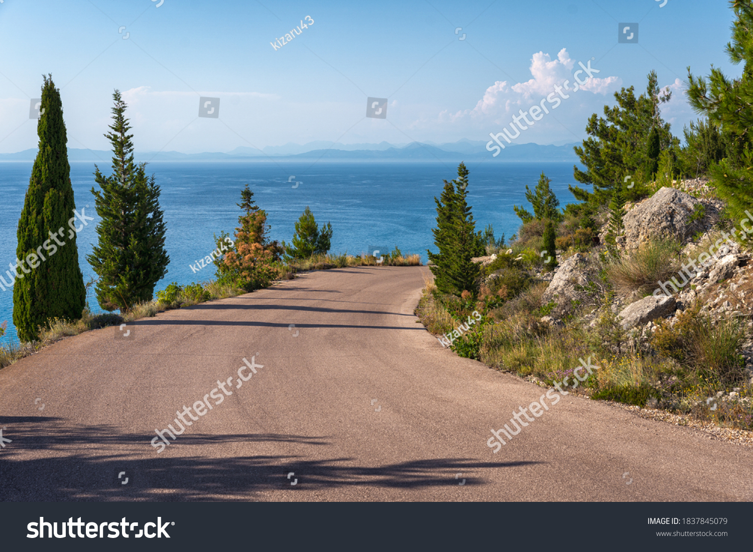 Serpentine road to Megali Petra beach in Lefkada #1837845079