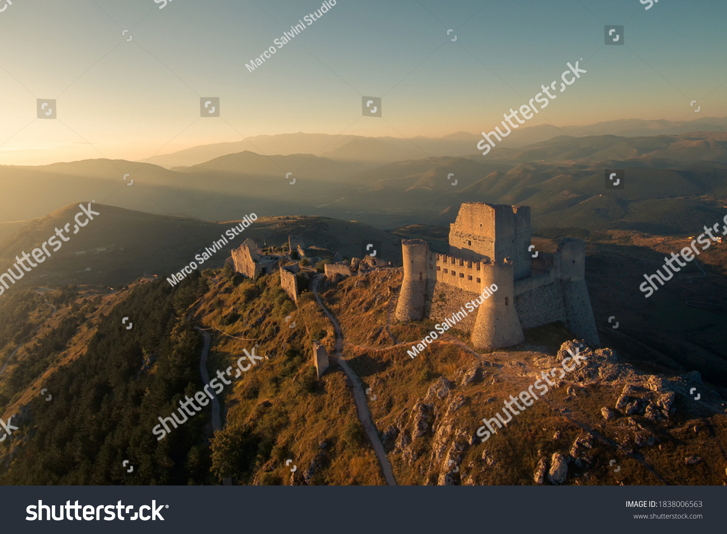 Castle of Rocca Calascio with mountains at sunrise. #1838006563