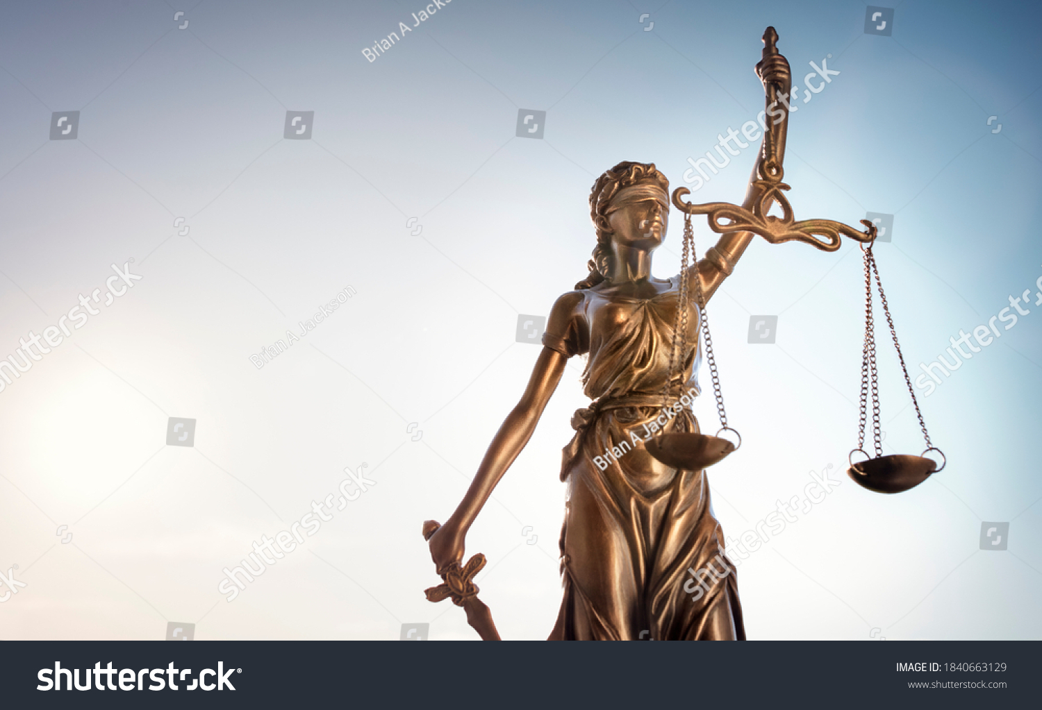 Legal and law concept statue of Lady Justice with scales of justice and sky background #1840663129