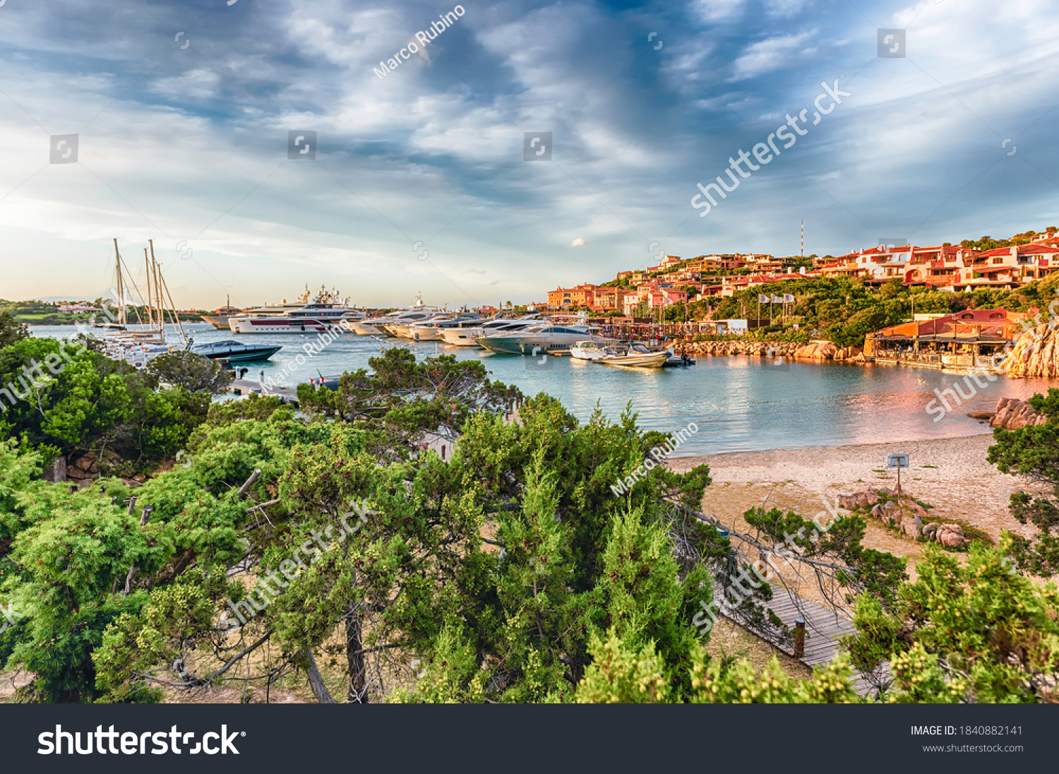 View of the harbor with luxury yachts of Porto Cervo, Sardinia, Italy. The town is a worldwide famous resort and a luxury yacht magnet and billionaires' playground #1840882141