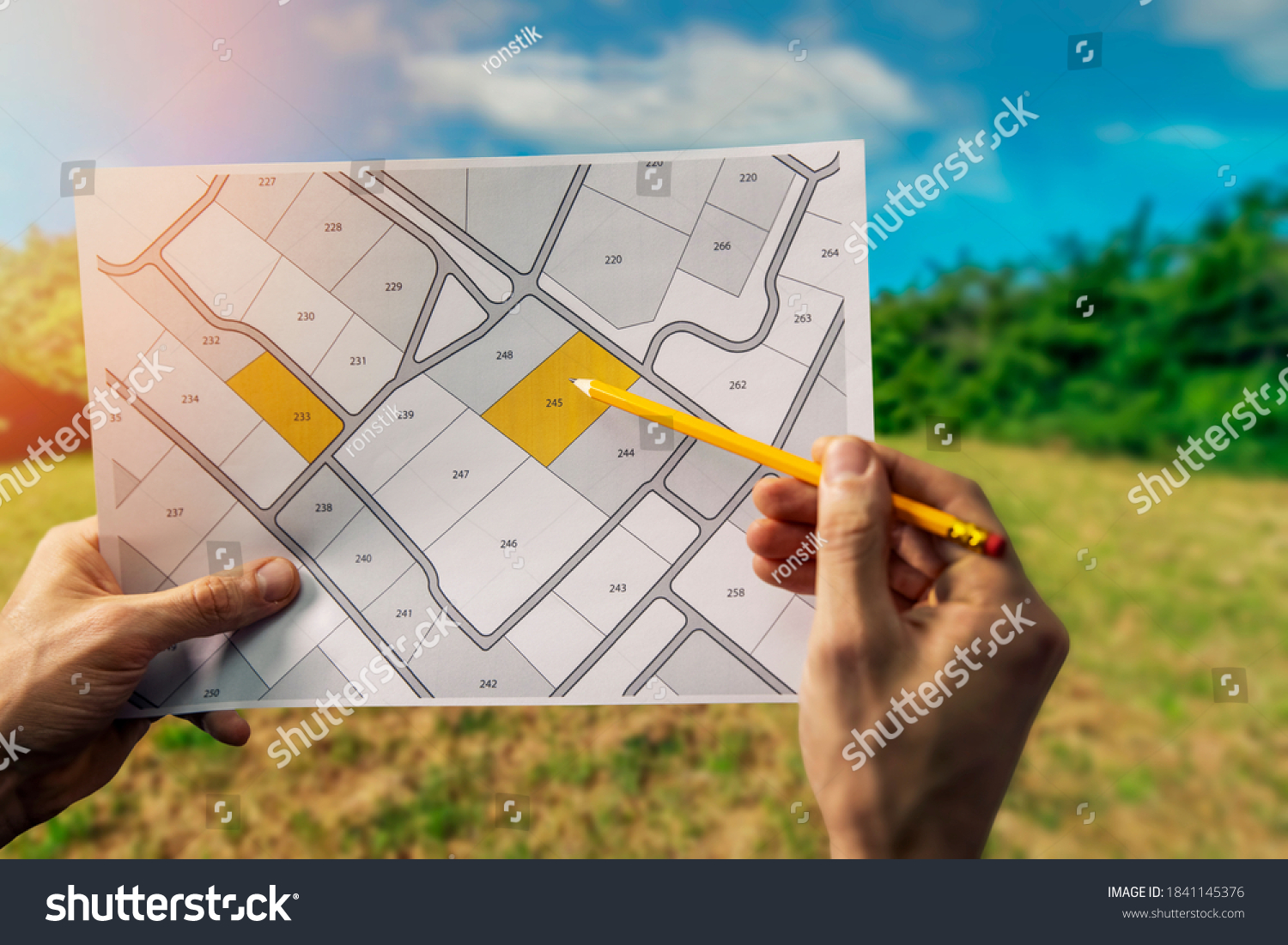 sale of building plot of land for house construction. cadastral map on field background #1841145376
