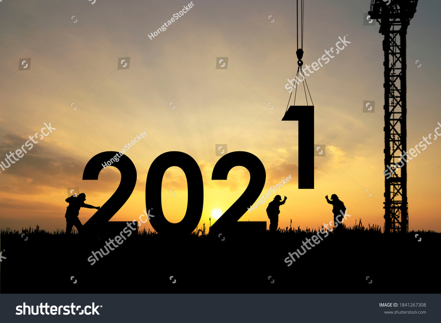 Silhouette staff works as a team to prepare to welcome the new year 2021 #1841267308