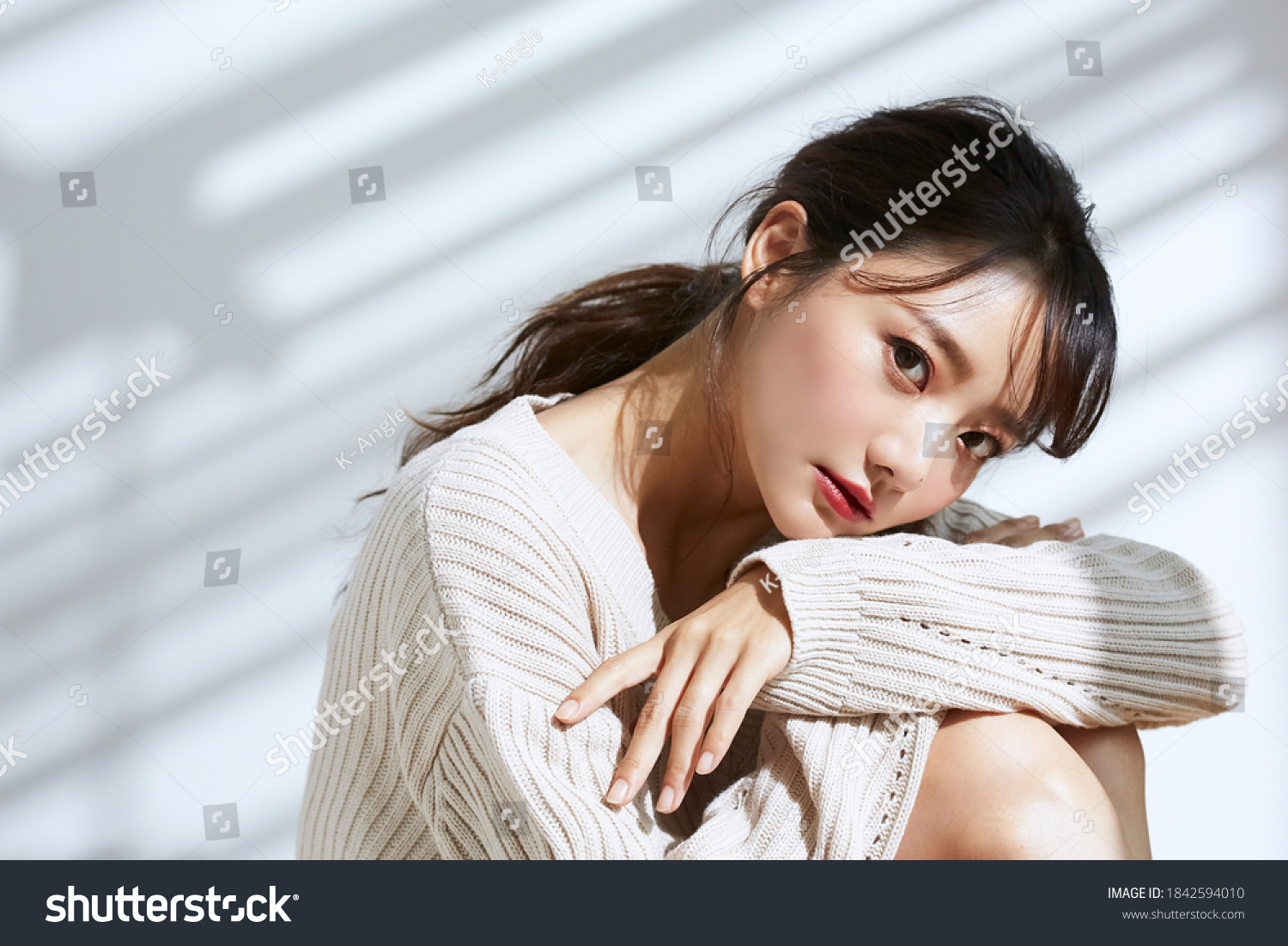 
Beauty portrait of young Asian women on light and shadow background #1842594010