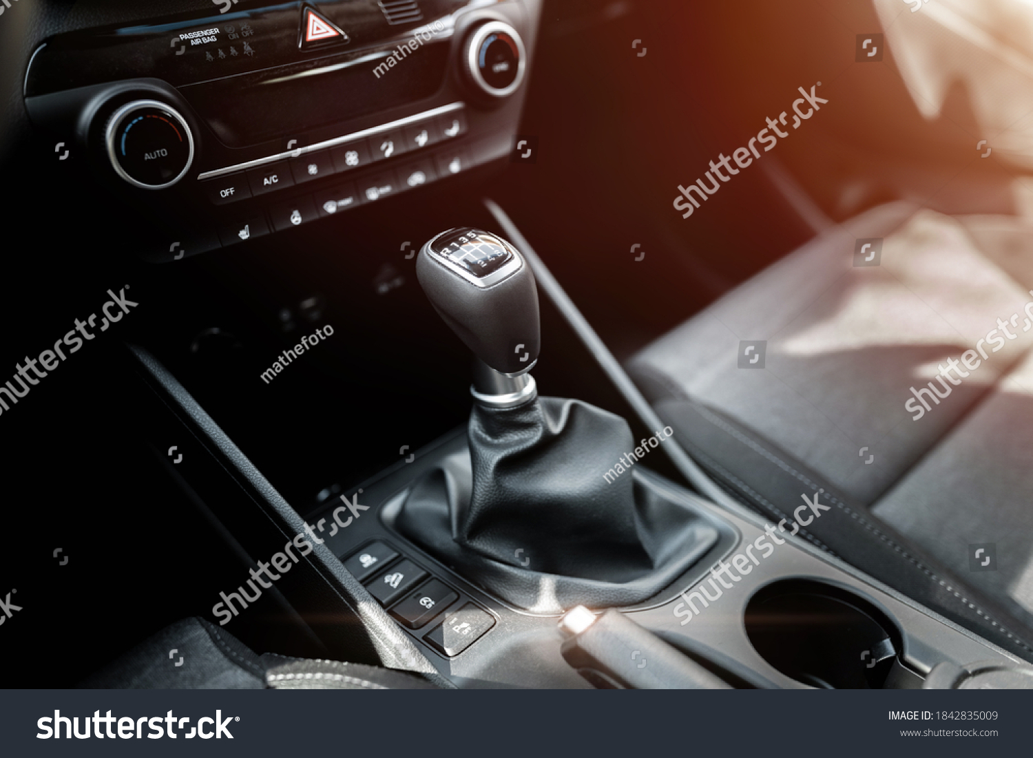 Interior view of a modern new car. Manual transmission gear of new car. #1842835009
