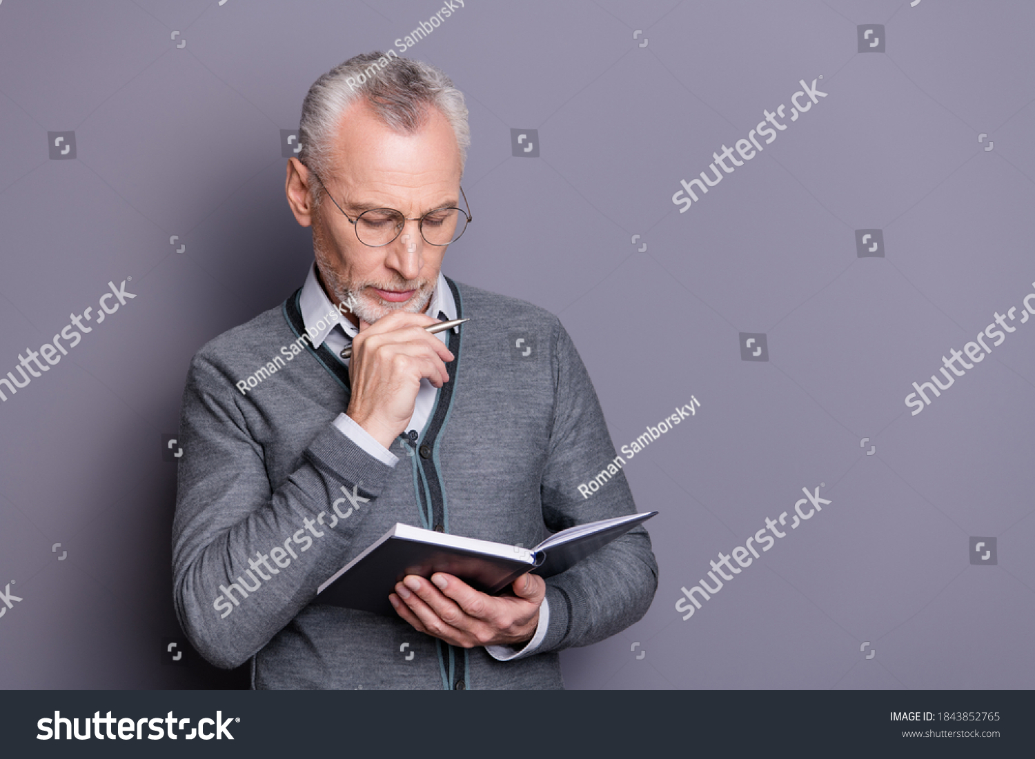 Portrait of his he nice-looking attractive calm focused intellectual business shark wearing casual formal-wear thinking about notes essay isolated over gray pastel background #1843852765