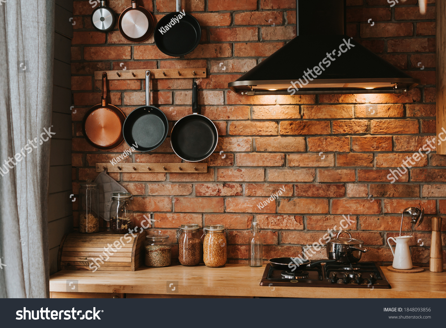 details of a cozy kitchen interior with a brick wall #1848093856