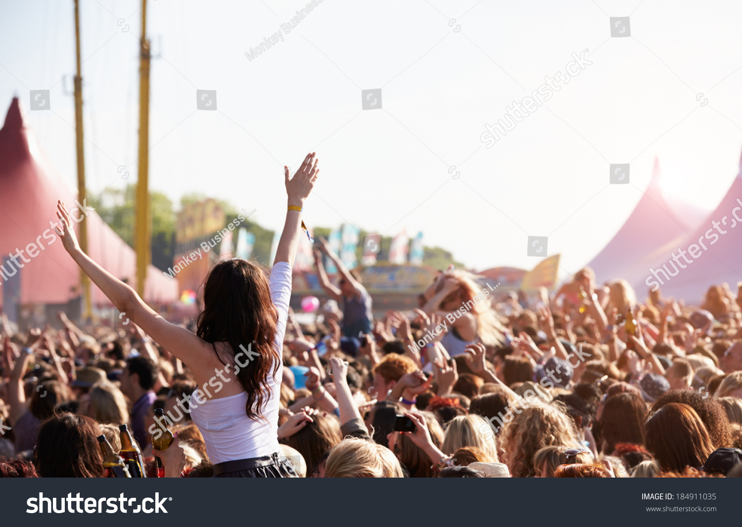 Crowds Enjoying Themselves At Outdoor Music Festival #184911035