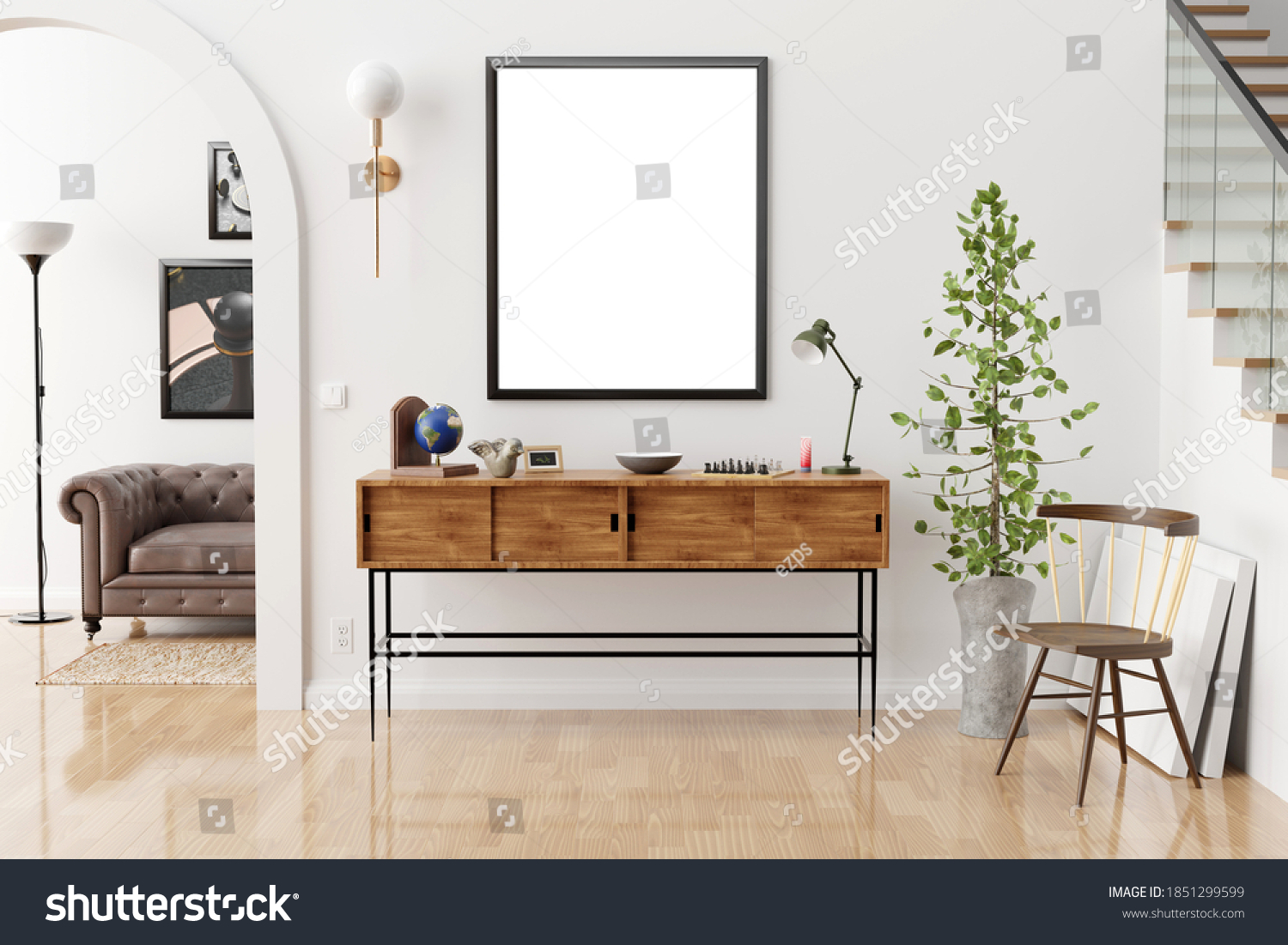 Stylish and eclectic dining room interior with mock up poster map, sharing table design chairs, gold pedant lamp and elegant sofa in second space. White walls, wooden parquet. Tropical leafs in vase. #1851299599