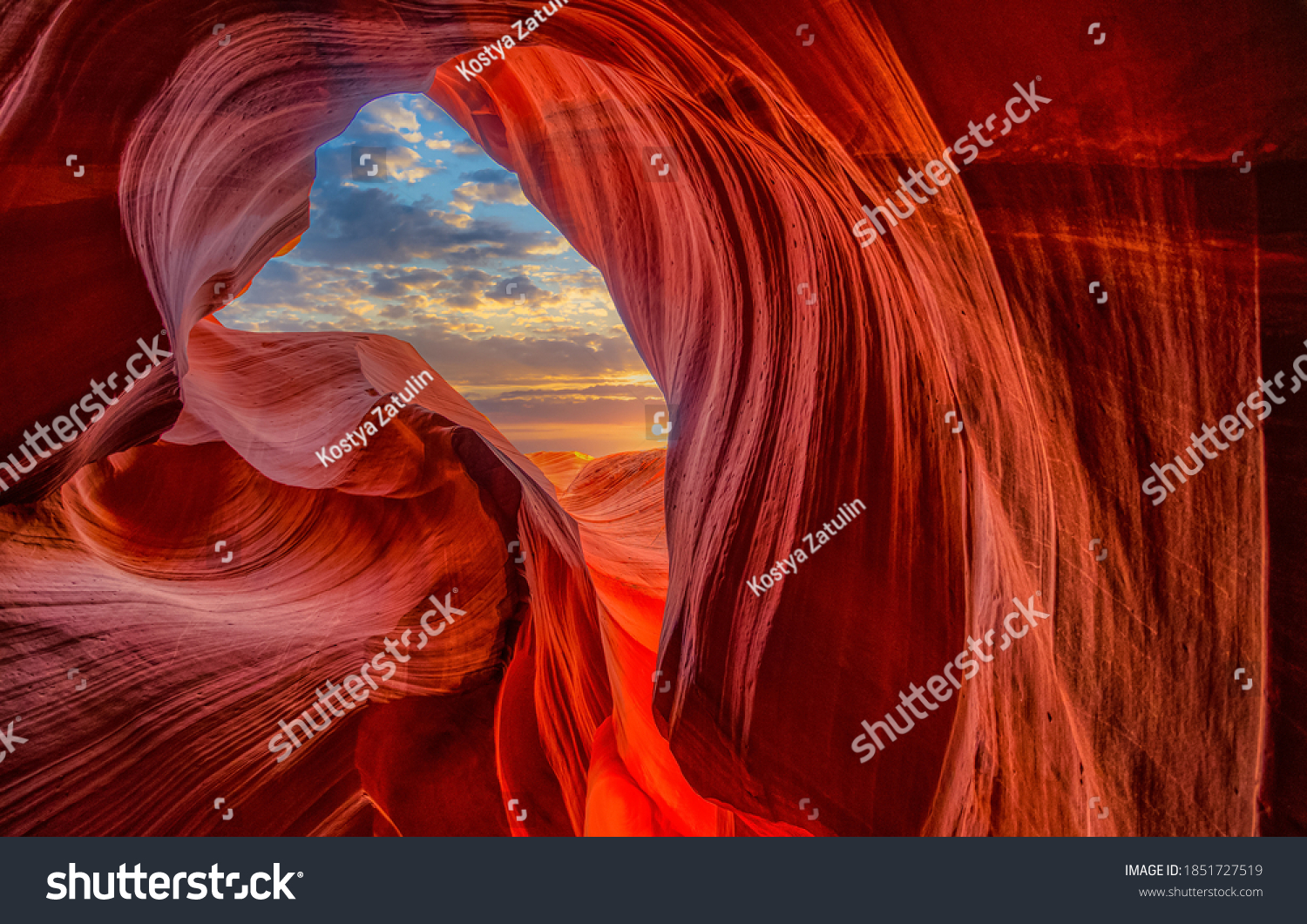 Cave light in abstract naturally red sandstone rock mountains #1851727519