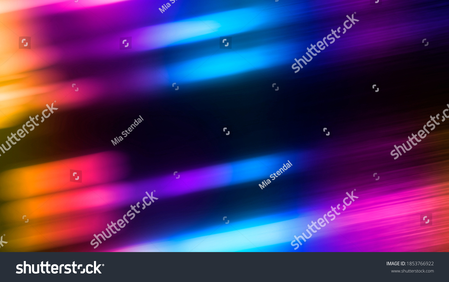 Multi-colored neon lights on a dark city street, reflection of neon light in puddles and water. Abstract night background, blurred bokeh light. Night view. #1853766922