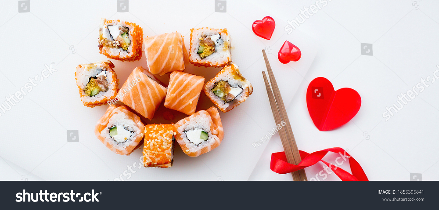 
Banner. Valentine's Day. Sushi and sticks on a white background.
The concept of a romantic dinner at a sushi bar. The portfolio has more images by February 14th. #1855395841