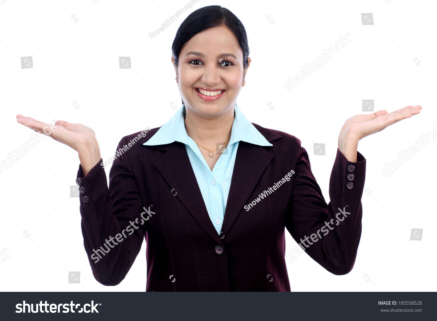 Excited young business woman against white background #185558528