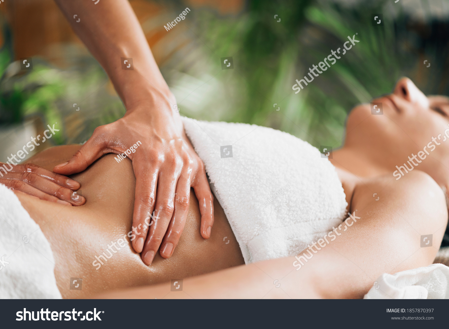 Ayurveda stomach massage in salon #1857870397