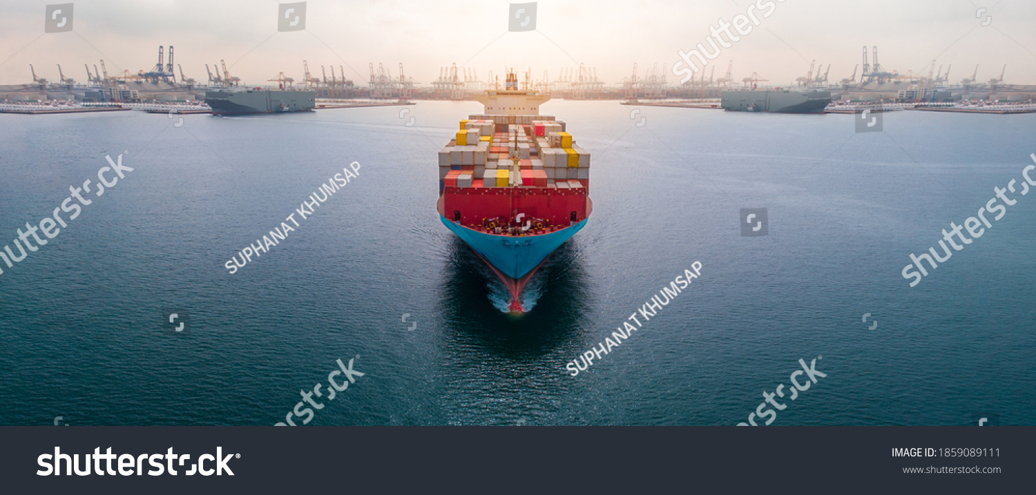 Aerial in front of cargo ship carrying container and running 
near international custom depot sea port concept smart logistic service.  forwarder mast #1859089111