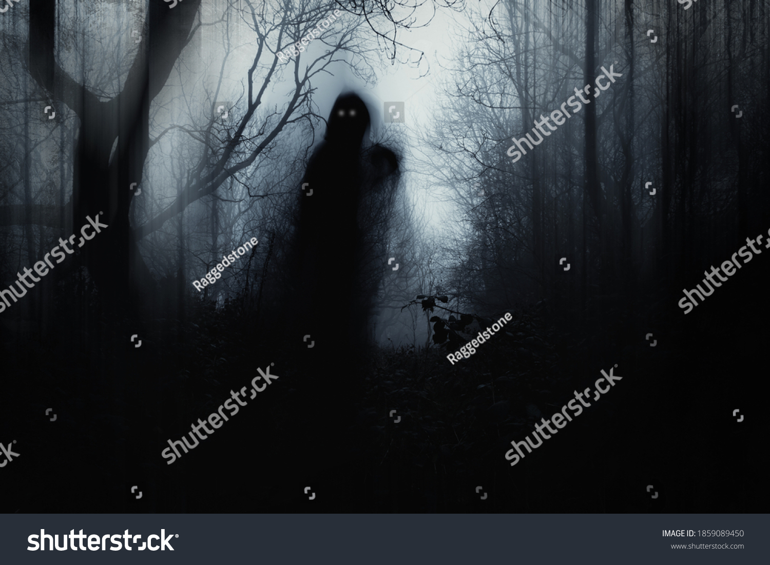 A scary hooded figure with glowing eyes in a spooky forest on a foggy winters day. With a artistic, blurred, abstract, grunge edit. #1859089450