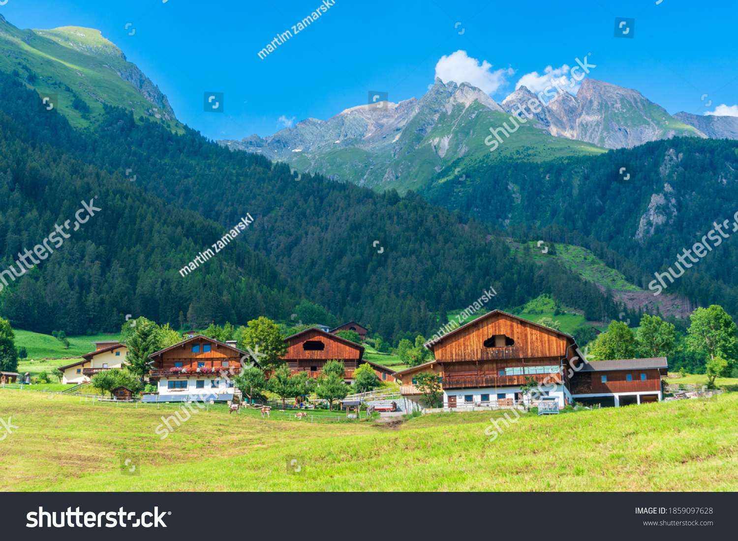 Mountain valley village landscape in Venediger alps . Mountain green valley village view austria near matrei in osttirol #1859097628