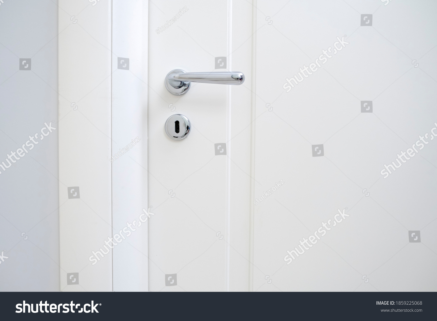 metal handle of modern new room white door #1859225068