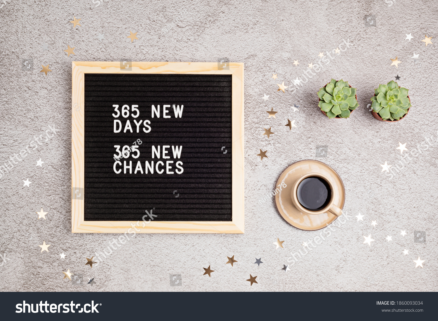 365 new days, 365 new chances. Letter board with motivational quote on grey concrete background with coffee cup. New year resolutions and goal setting, self improvement and development concept.  #1860093034