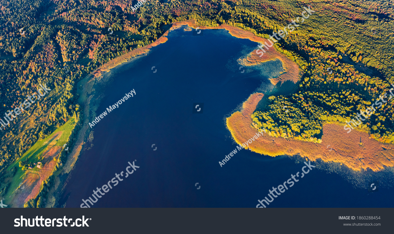 Straight down view of Krymne Lake. First sunlight glooving the shoure of fishing lake. Bright morning scene of Shatsky National Park, Volyn region, Ukraine, Europe. Aerial landscape photography.
 #1860288454
