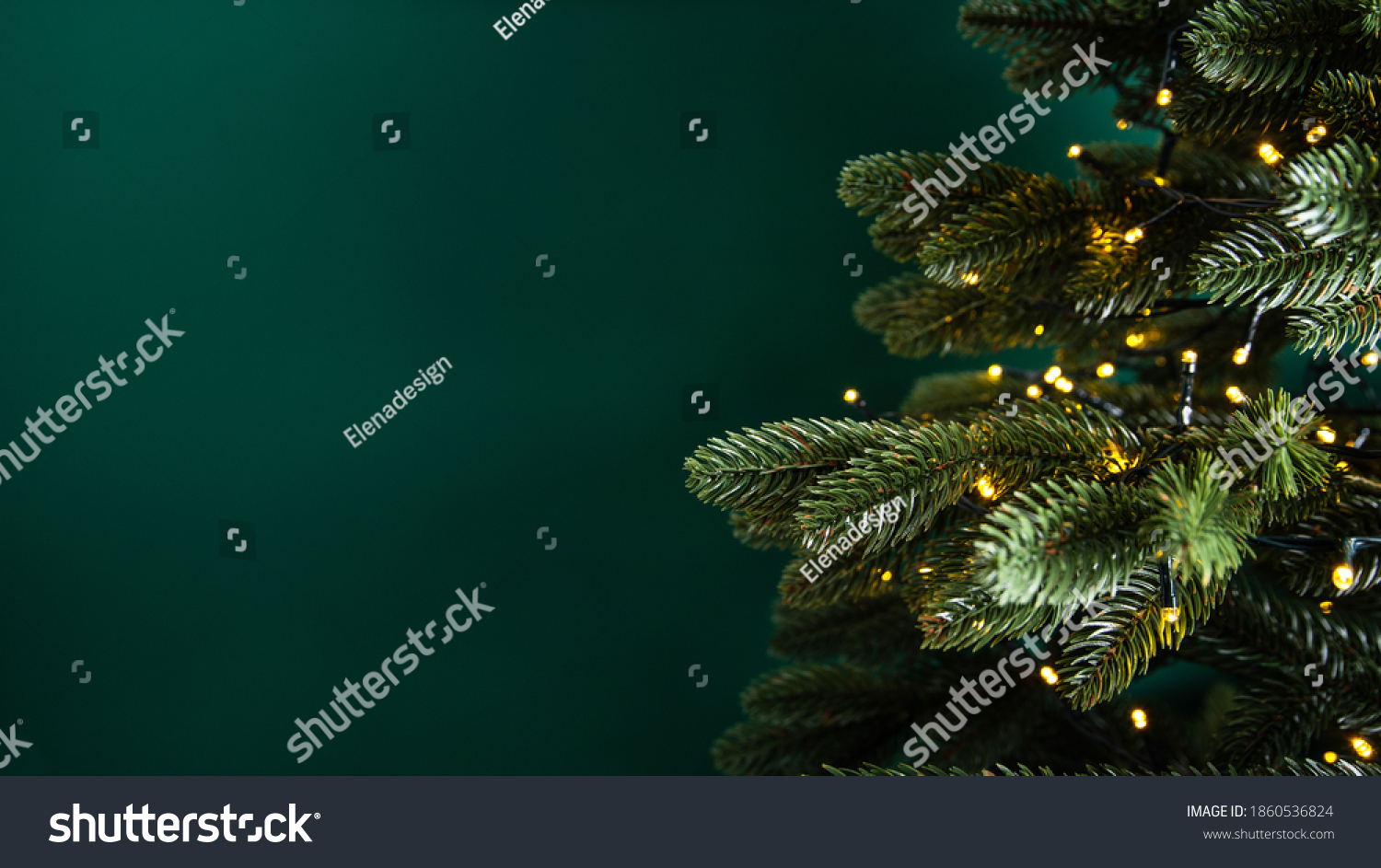 Decorated with lights Christmas tree on dark green background. Merry Christmas and Happy Holidays greeting card, frame, banner. New Year. Noel. Winter holiday theme.  #1860536824