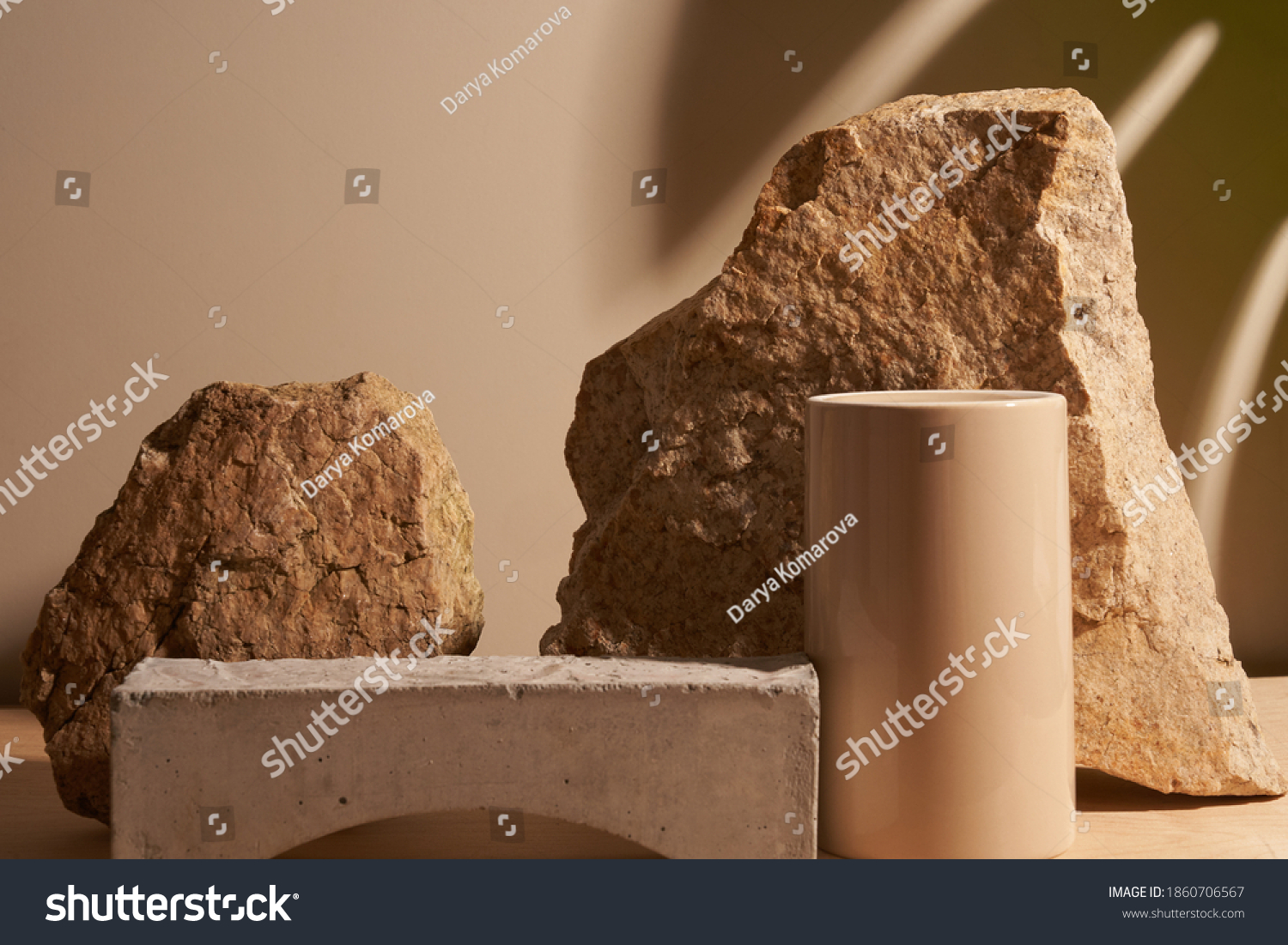 Beige stone and a piece of grey podium tile on a beige background, natural background with shadow of tropical plant for your product #1860706567