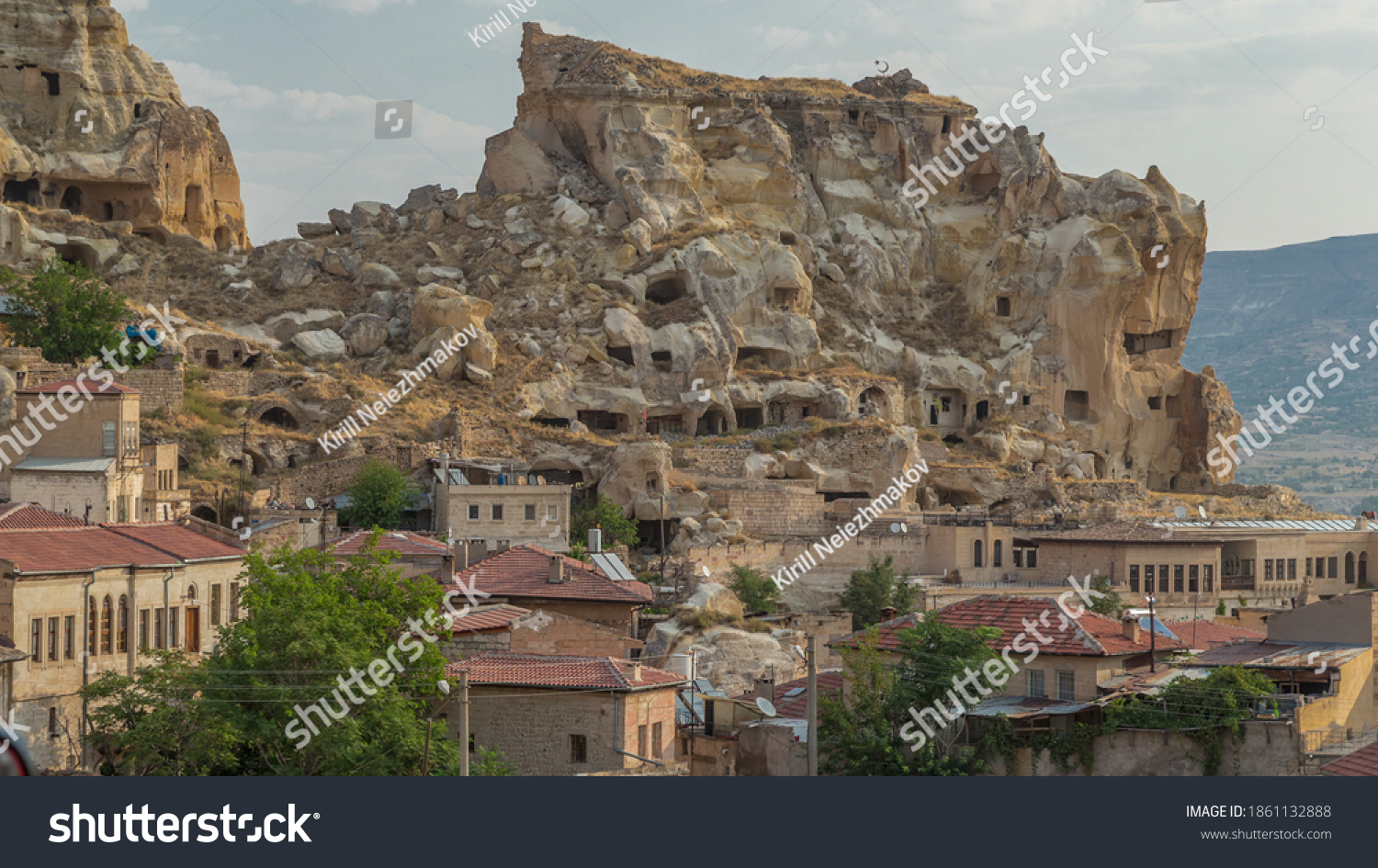 Urgup Town aerial view from Temenni Hill in Cappadocia Region of Turkey timelapse. Old houses and buildings in rocks at early morning #1861132888