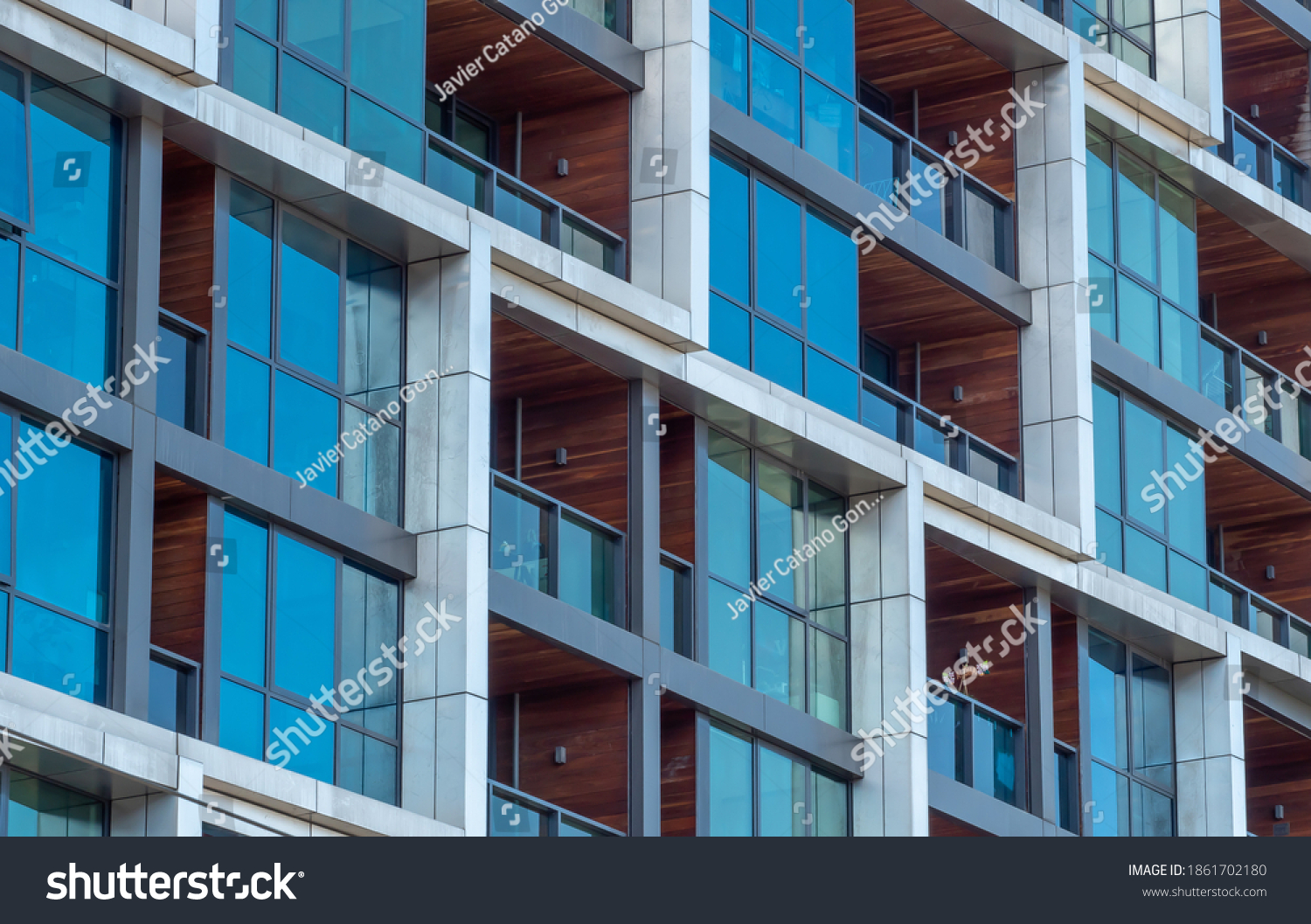 Close up of windows and balconies of a modern multi dwelling building of strata title living scheme. #1861702180