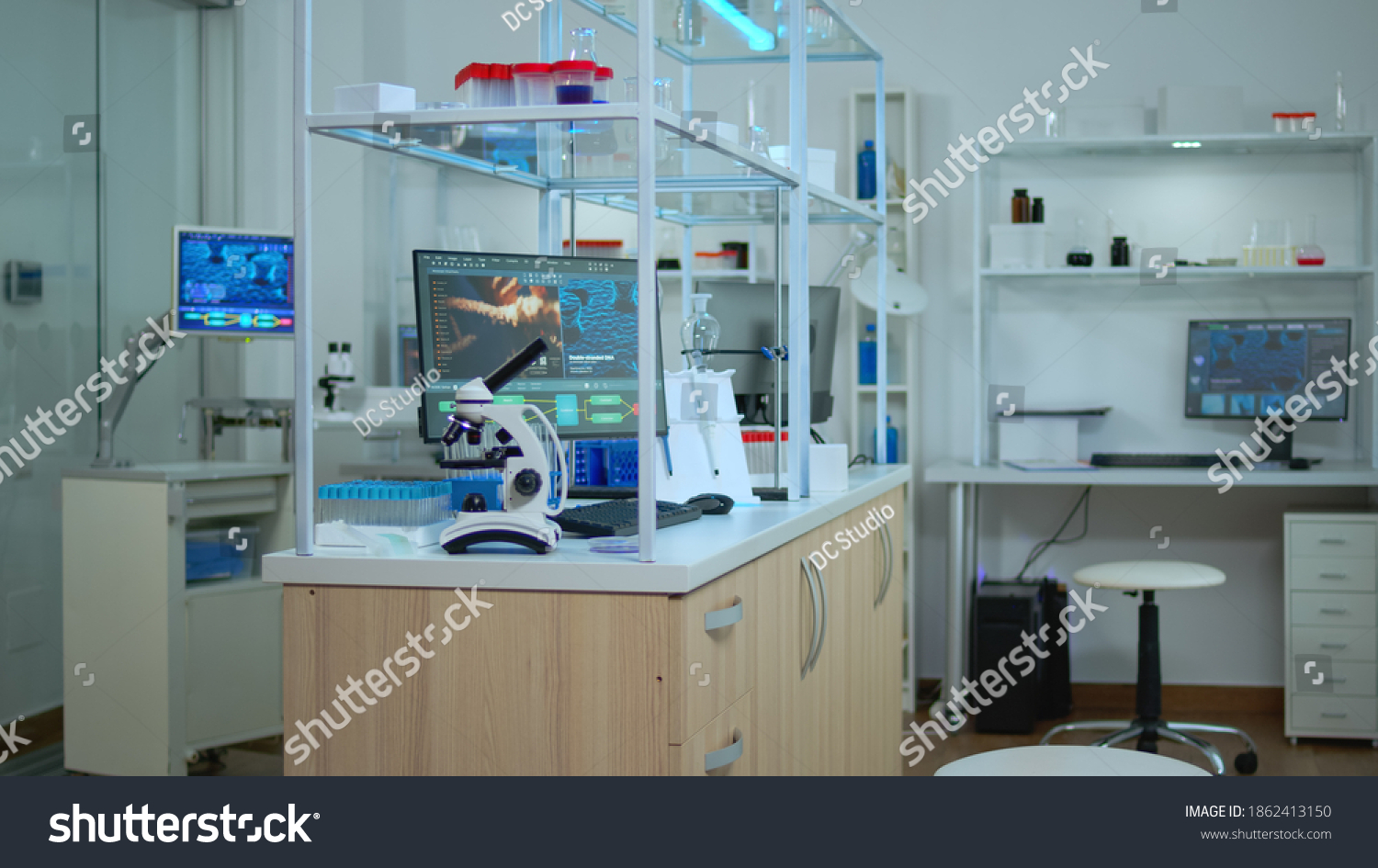 Empty laboratory modernly equipped with nobody in it, prepared for pharmaceutical innovation using high tech and microbiology tools for scientific research. Vaccine development against covid19 virus. #1862413150