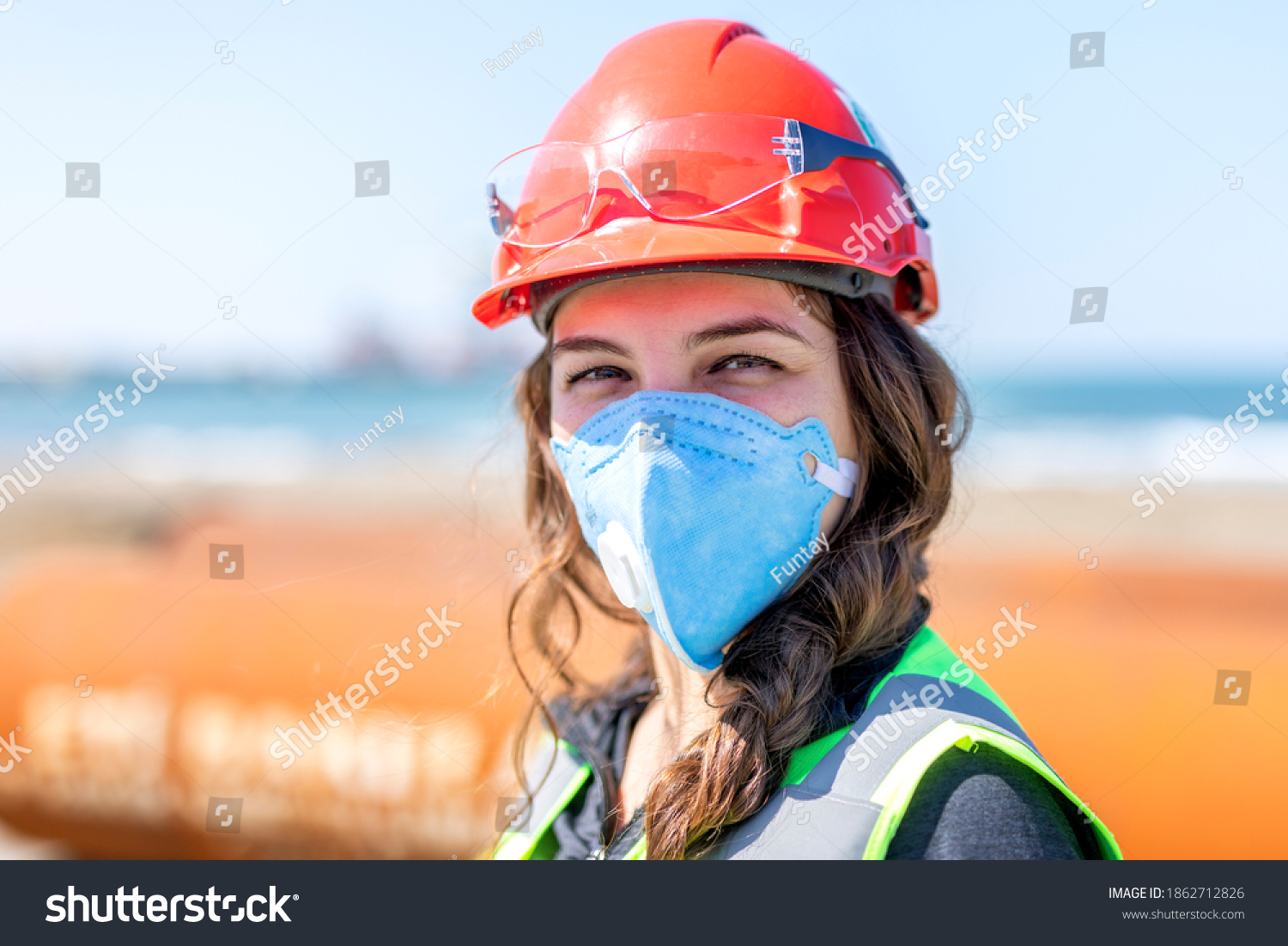 Occupational safety and health specialist with face mask for coronavirus (covid-19). Occupational health is a multidisciplinary field of healthcare concerned with enabling an individual. #1862712826