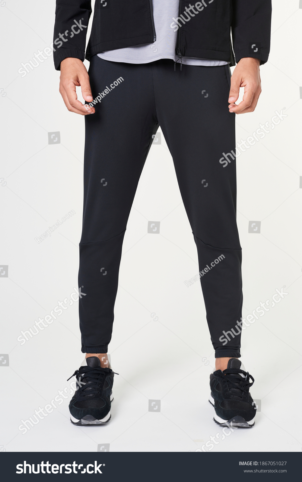 Man in black jogger pants mockup #1867051027