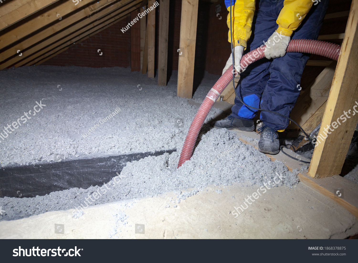 Spraying cellulose insulation in the attic of a house. Insulation of the attic or floor in the house #1868378875
