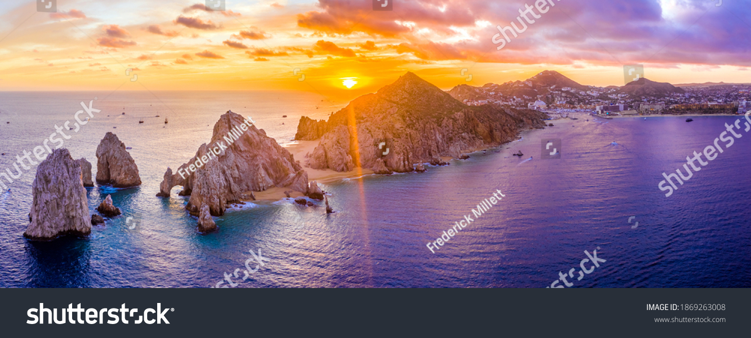 Aerial panoramic view of the Cabo San Lucas, Mexico marina and the rock formations at Lands End. the southernmost tip of the Baja California peninsula, where the Sea of Cortez meets the Pacific Ocean #1869263008