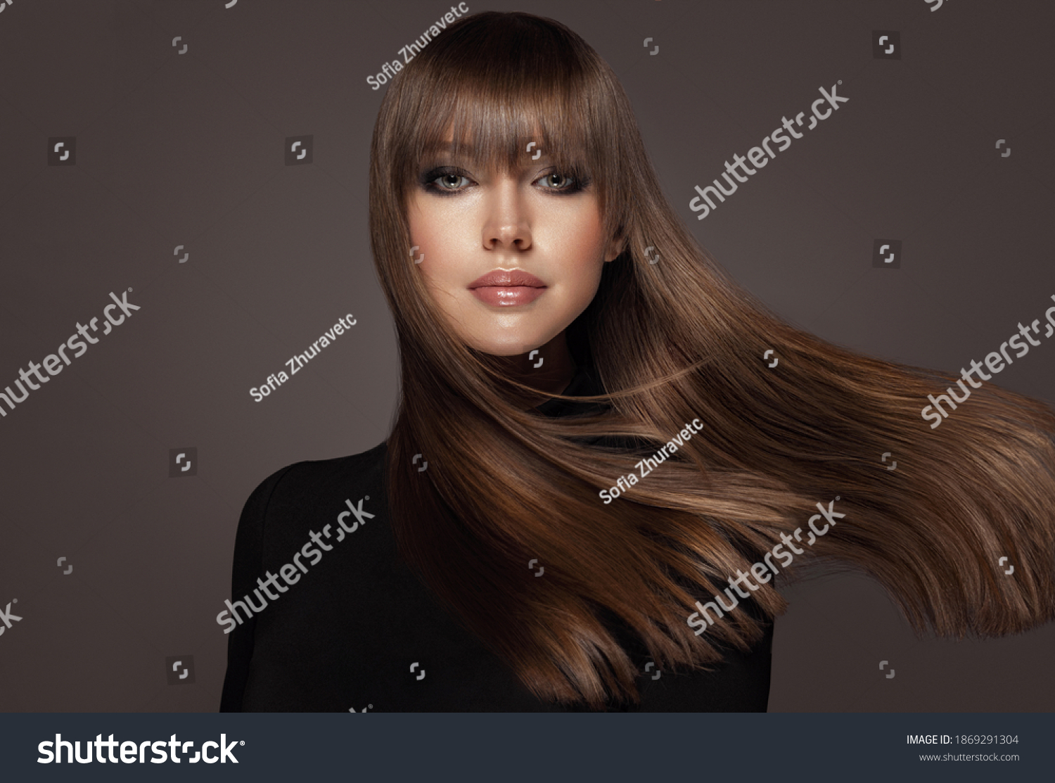 Beautiful model woman with shiny and straight long hair. Keratin straightening. Treatment, care and spa procedures. Beauty girl smooth hairstyle #1869291304